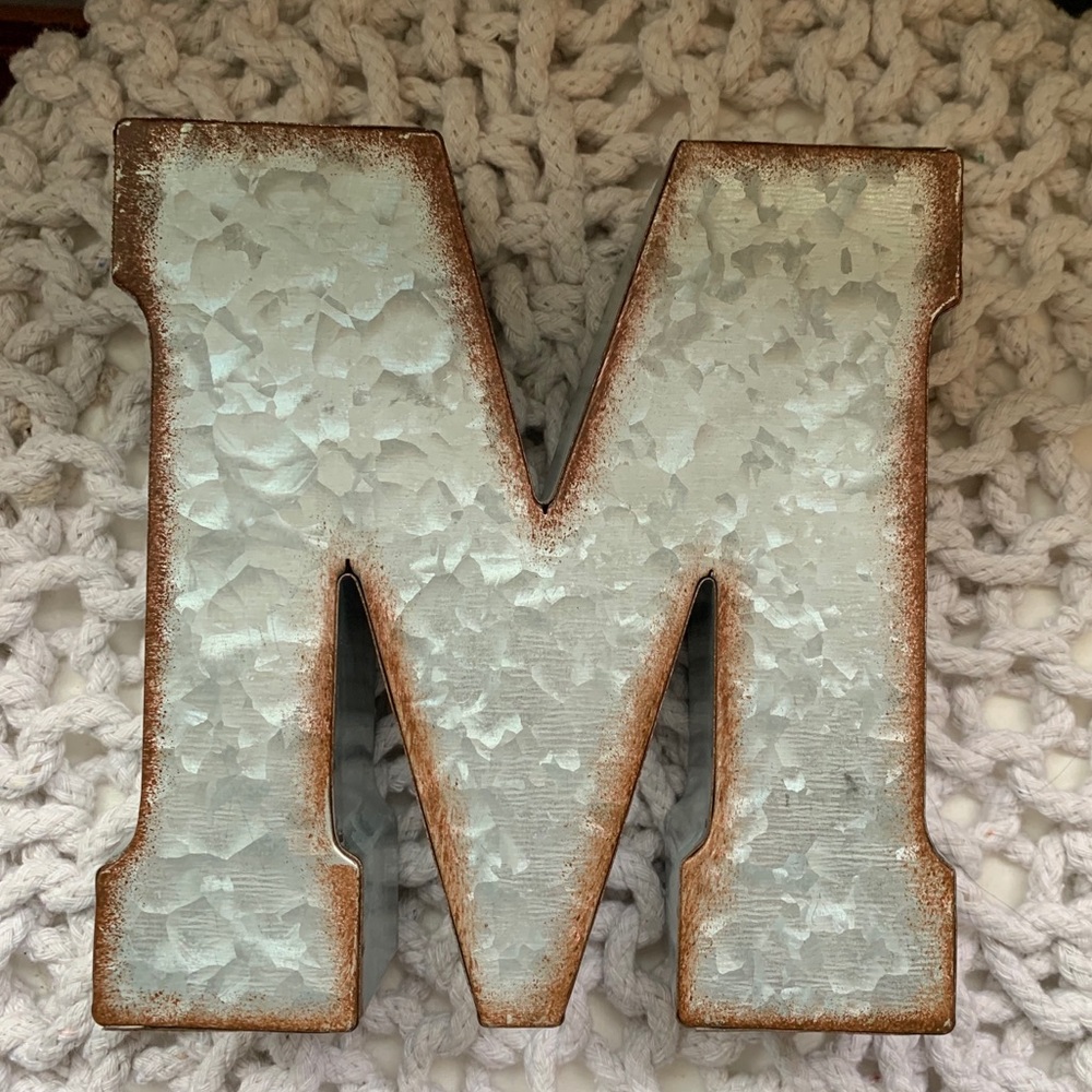 Galvanized M wall decor